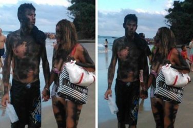 Casal é pintado por moradores após pichar pedra em praia de Guarujá